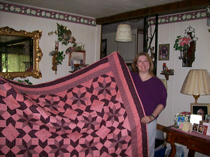 Kim Kelley wins the Rose Quilt